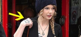 Taylor Swift Wears Her Lucky Number 13 painted On Her Hand