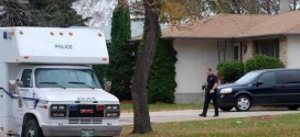 Winnipeg Police search accused woman's home as legal battle continues over autopsies