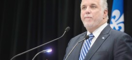 Premier Couillard raked over coals for not speaking French in Iceland