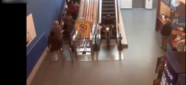 Biker zooms down Surrey mall escalator (Video)