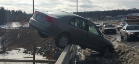 Teen's car teeters : Colin Malone escapes car hanging off bridge over NH river