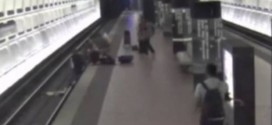 Man in wheelchair rescued from Metro tracks (Video)