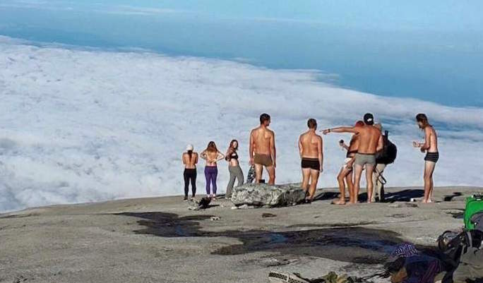Woman On Mountain : Malaysia detains 2 Canadians among 4 Westerners for alleged naked pose on mountain