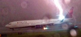 Lightning Bolt Strikes Delta Airliner : Video captures plane on runway getting struck by lightning