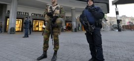 Belgium police arrest 21, Paris fugitive still at large