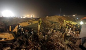 Pakistan factory collapse kills 20, over 100 rescued