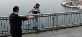 Erdogan talks man on bridge out of suicide (Video)